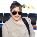 Khloe Kardashian Sports Animal Print Head Scarf