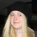 Dakota Fanning Goes Makeup-Free At LAX