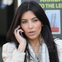 Kim Kardashian Gabs On The Phone During A Shopping Spree