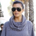 Kim Kardashian Stikes A Pose In A Poncho