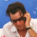 Charlie Sheen Has A Smoke At The Pool In Miami