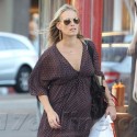 Molly Sims Shows Off Baby Bump