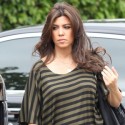 Kourtney Kardashian Comforts Kim After Flour Incident