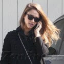 Jessica Alba Carries A Family Portrait To Work