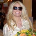 Pamela Anderson Lands In Austria