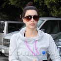 Kim Kardashian Braves The Rain To Hit The Gym