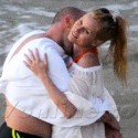 Nicollette Sheridan Relaxes On The Beach With Her New Beau