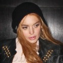 Lindsay Lohan Leaves A NYC Party Holding Swag Bag