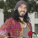 Russell Brand Throws Roses At Photographers!