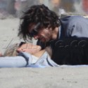 Sharon Stone Gets Frisky On The Beach With Younger Guy