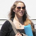 Elizabeth Berkeley Takes Her Baby Bump To Yoga