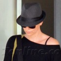 Charlize Theron Covers Up Her Shaved Head