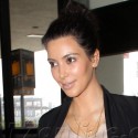 Kim Kardashian Goes Makeup Free Jetting Out Of LAX
