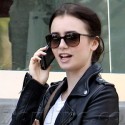 Lily Collins Chats On Her Cell While Strolling Through Beverly Hills