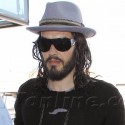 Russell Brand Heads For His Flight To The UK