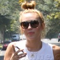 Miley Cyrus Shows Off Her Amazing Midsection