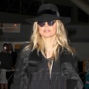 Fergie Arrives At JFK Airport In All Black