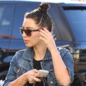 Kim Kardashian Wears High Top Sneakers To The Studio