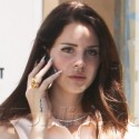 Lana Del Rey Is Glued To Her Cell Phone