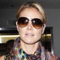 Heidi Klum Rocks A Colorful Ensemble At LAX