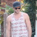 Liam Hemsworth Takes A Ride On His Skateboard