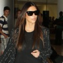 Kim Kardashian Struts Through Miami Airport