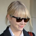 Emma Stone Lands At LAX