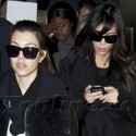 Kim And Kourtney Jet In To JFK International Airport