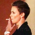 Charlize Theron Lights Up A Cigarette