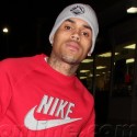 Chris Brown Flashes Us The Peace Sign