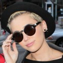 Miley Cyrus Poses With Fans In NYC