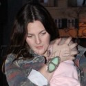 Drew Barrymore Holds Her Little Girl While Out Shopping