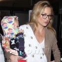 Kate Hudson And Her Sons Land At L.A.X.