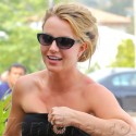 Britney Spears Struggles To Keep Her Strapless Dress Up