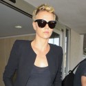 Charlize Theron Lands At LAX