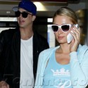 Paris Hilton And Boyfriend Arrive At LAX