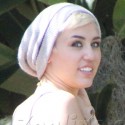 Miley Cyrus Shows Some Side Boob At The Recording Studio