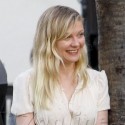 Kirsten Dunst Smokes A Cigarette With A Friend