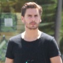 Scott Disick Grabs Tea In His Yellow Ferrari