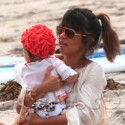Kourtney Whips It Out For Penelope On The Beach