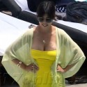 Kourtney Kardashian Rocks Yellow One-Piece Suit During Pool Day With Kids