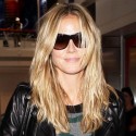 Heidi Klum Is All Smiles At LAX