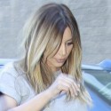 Kim Kardashian Steps Out In A Skintight Green Skirt