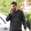 Scott Disick Gasses Up In A Yeezus Tee