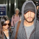 Kourtney Kardashian And Scott Disick Land At LAX