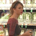 Taylor Swift Listens To Some Tunes While She Grocery Shops In Beverly Hills