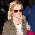 Reese Witherspoon And Husband Fly Back From Vacation