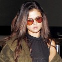 Selena Gomez Lands At LAX