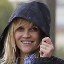 Reese Witherspoon And Jim Toth Try To Stay Dry