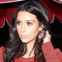 Kim Kardashian Slips Into A Sexy Red Outfit